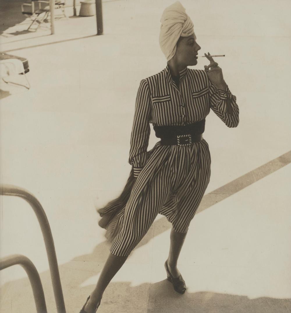 Louise Dahl-Wolfe comparable auction result: louise dahl wolfe 1895 1989 woman smoking in stripped dress circa 1941