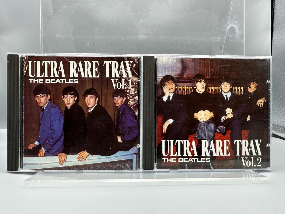 The Beatles (2-CD Lot): Ultra Rare Trax Vol.1 (1988); and Ultra Rare Trax Vol. 2 (1988). Note: These are CDs - NOT vinyl records. sold by Richard L. Edwards Auctioneer, lot 139A — auction record photograph