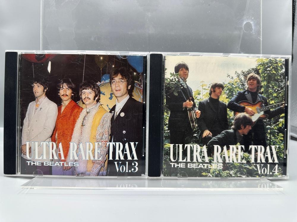 The Beatles (2-CD Lot): Ultra Rare Trax Vol.3 (1989); and Ultra Rare Trax Vol. 4 (1989). Note: These are CDs - NOT vinyl records. sold by Richard L. Edwards Auctioneer, lot 140A — auction record photograph