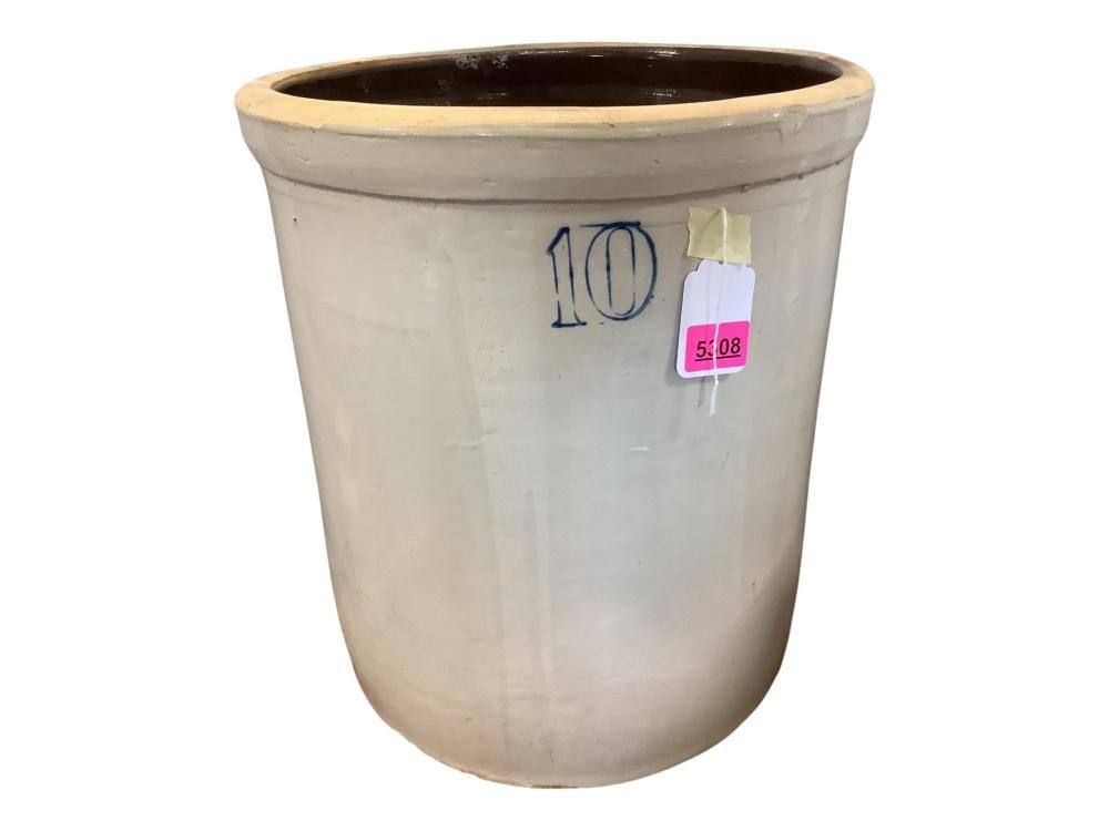 Cream-colored stoneware crock with a dark rim and blue handwritten “10” marking on the side.