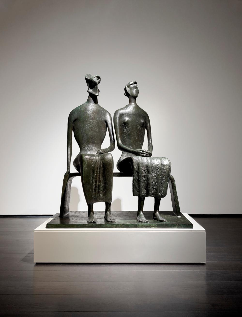 Henry Moore (1898-1986). King and Queen. bronze with a dark green and brown comparable sale