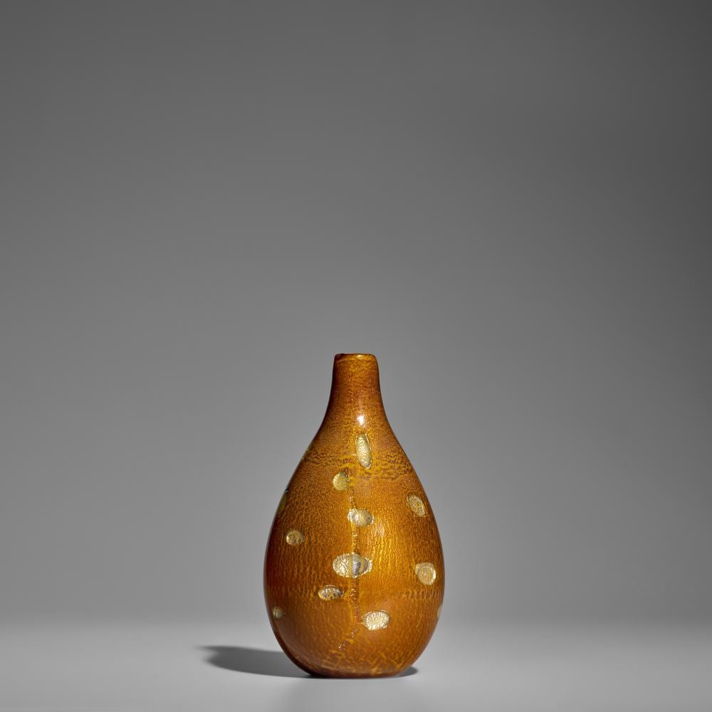 Giulio Radi comparable auction result: giulio radi 1895 1952 reazioni polichrome vasecirca 1955for a v e m hand blown glass with metallic inclusionsheight 8 5 8in 22cm diameter 4 3 4in 12cm