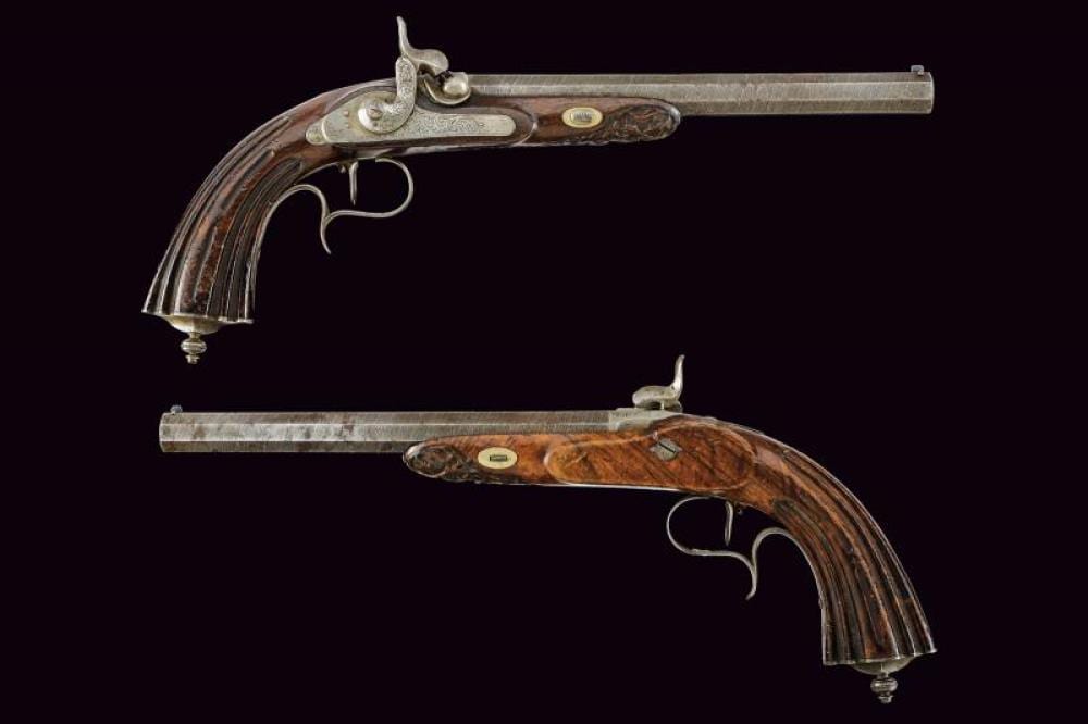 Marco Carna' comparable auction result: a pair of percussion target pistols by colombo