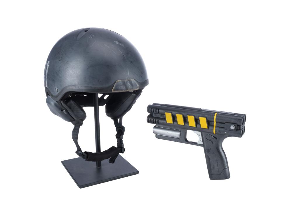 DEADPOOL 2 (2018) - Screen-Matched #41 Department of Mutant Corrections Helmet with Pistol sold by Propstore Los Angeles, lot 932 — auction record photograph