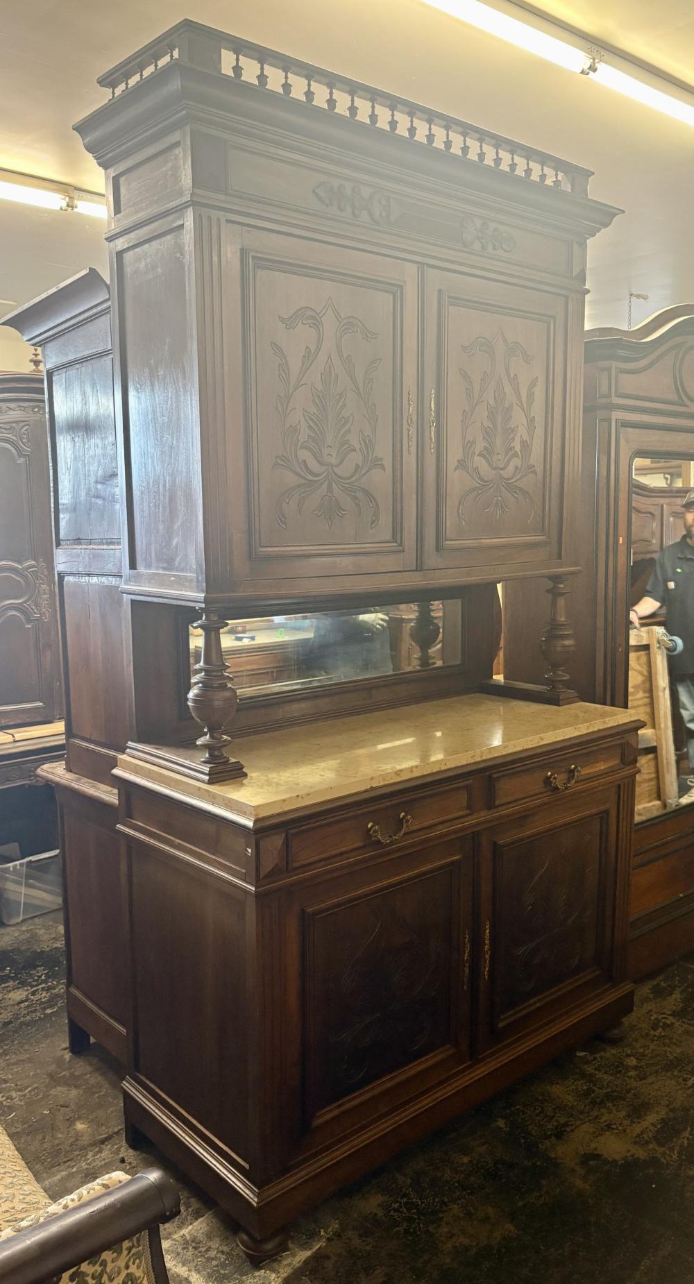 Antique French Renaissance Revival-style Buffet Hutch, likely made of walnut or oak, featuring Ornate Carvings, Marble Top, and a Mirrored Back Gallery - 23"x56"x98" - NOT AVAILABLE FOR SHIPPING, PICK UP OR TRANSPORT ONLY sold by Swisher Bros. Auction, lot 250 — auction record photograph
