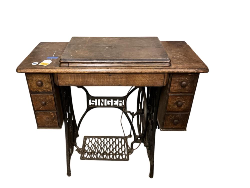 Antique Singer Treadle Sewing Machine, featuring a Wooden Table & Cast Iron Base and Belt sold by Apple Tree Auction Center, lot 3055 — auction record photograph