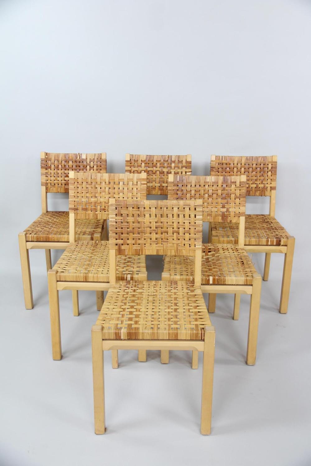 Aino Aalto comparable auction result: set of 6 rattan dining chairs model 615 by aino aalto