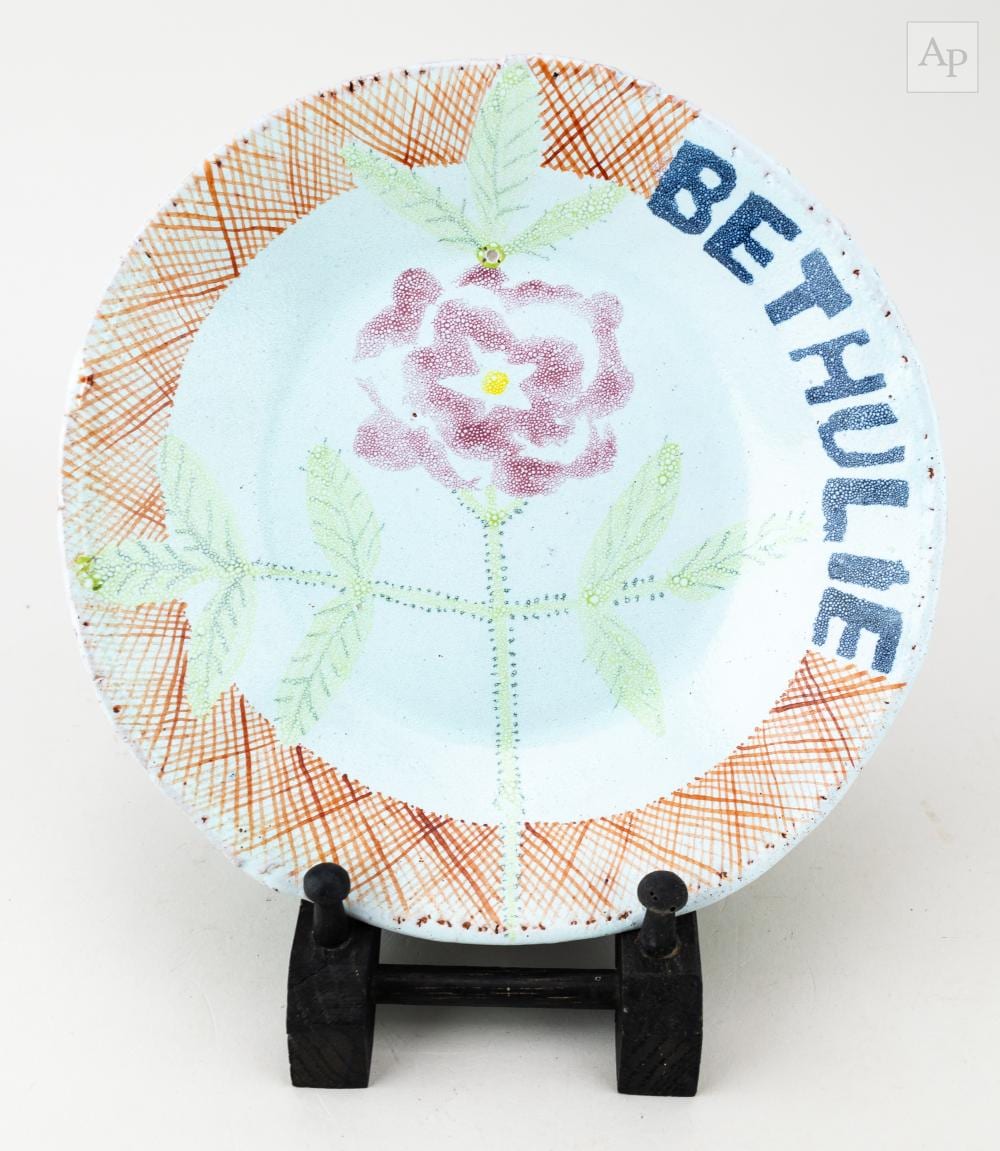 Hylton Nel comparable auction result: hylton nel born 1941 bethulie a tin glazed earthenware dish depicting a flower with inscribed text in afrikaans verso diameter 22cm
