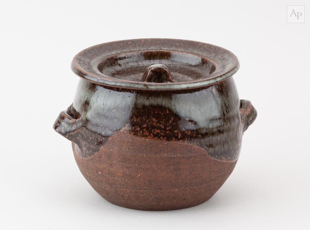 Janet Leach comparable auction result: janet leach 1918 1997 for leach pottery a small stoneware casserole partially covered in tenmoku breaking to kaki and grey glaze impressed jl and pottery marks height 12cm