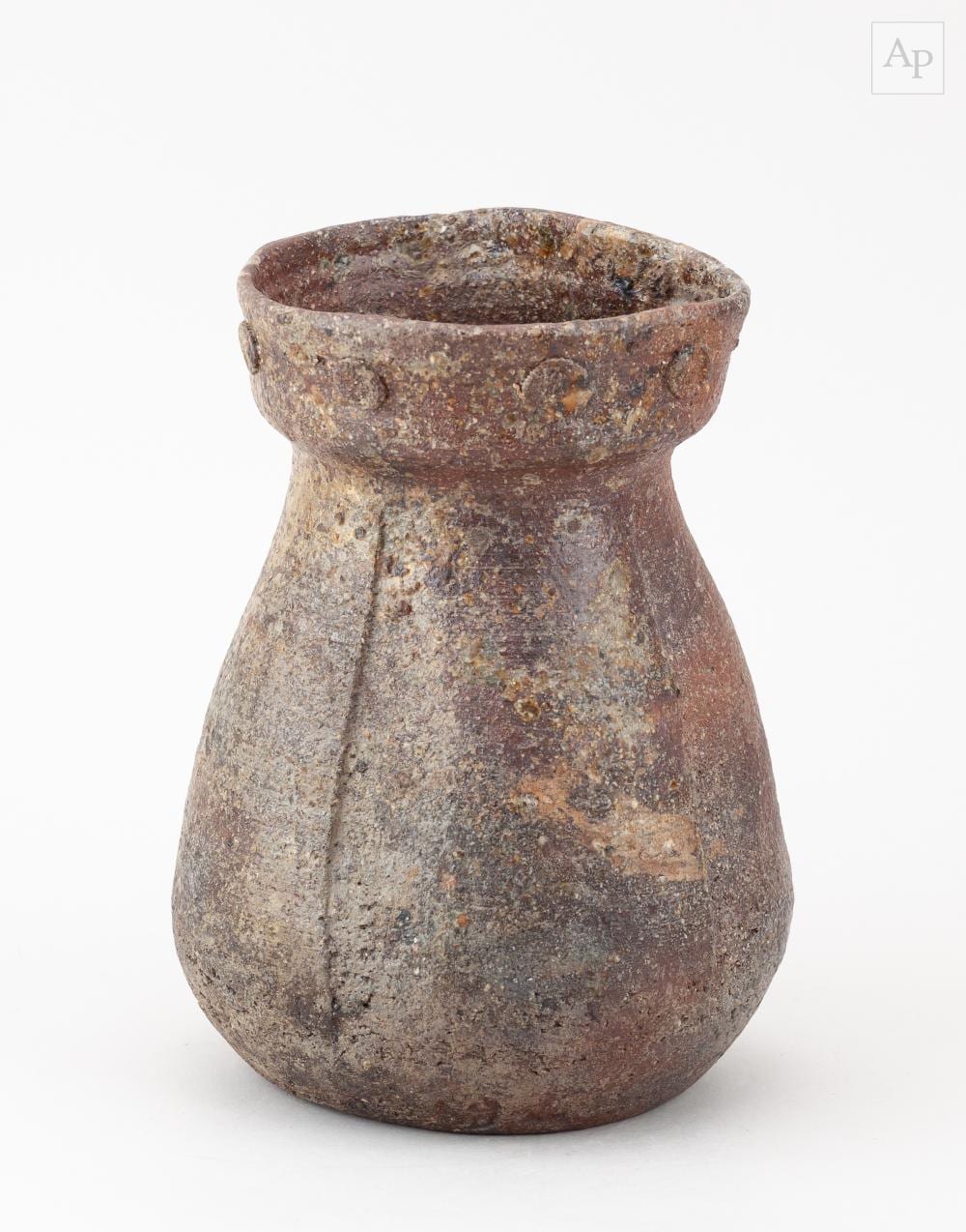 Janet Leach comparable auction result: janet leach 1918 1997 for leach pottery a stoneware vessel partially covered in ash glaze with applied roundels to the rim impressed jl and pottery marks height 19cm