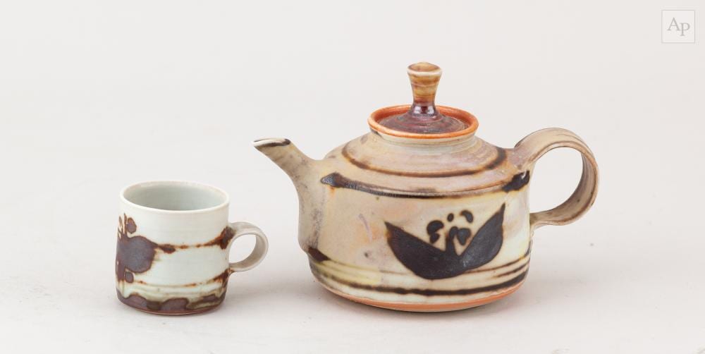 mary rich 1940 2022 a miniature porcelain teapot with iron decoration impressed m mark height 8cm and a matching cup 2 · Adam Partridge Auctioneers · 2026-03-27 Mary Rich comparable auction result: mary rich 1940 2022 a miniature porcelain teapot with iron decoration impressed m mark height 8cm and a matching cup 2