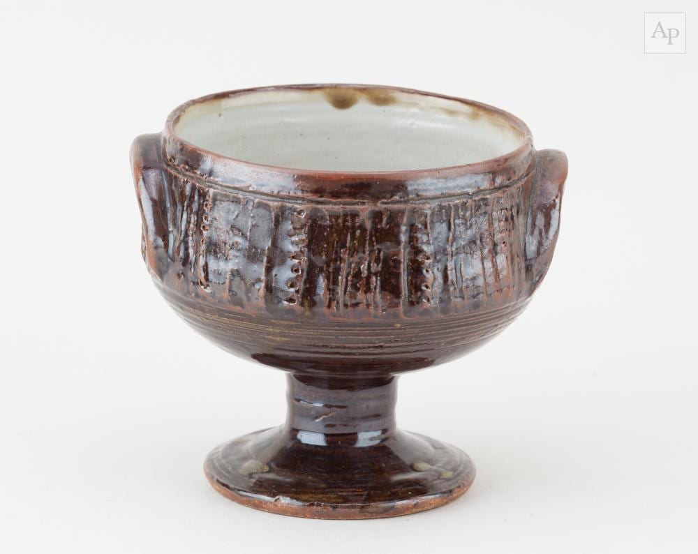 Michael Cardew comparable auction result: michael cardew 1901 1983 for wenford bridge pottery a fluted stoneware chalice covered in tenmoku breaking to kaki glaze impressed mc and pottery marks height 12 5cm