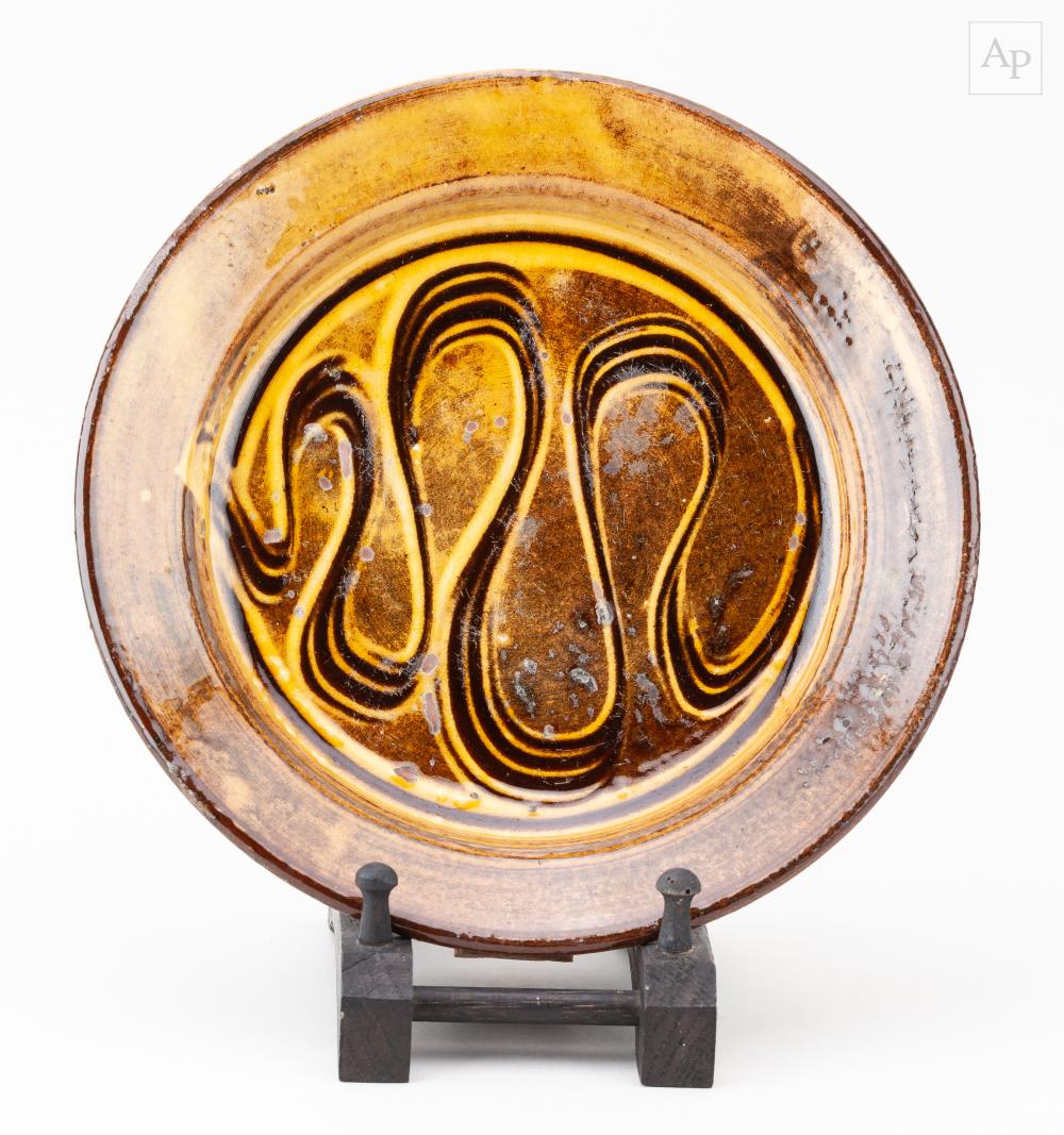 Michael Cardew comparable auction result: michael cardew 1901 1983 for winchcombe pottery a slipware plate with combed decoration impressed mc and pottery marks diameter 24 5cm