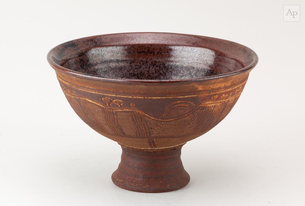 michael casson 1925 2003 a stoneware pedestal bowl covered in dry ash glaze with incised landscape decoration impressed mc mark made 1970s diameter 24cm · Adam Partridge Auctioneers · 2026-03-27 Michael Casson comparable auction result: michael casson 1925 2003 a stoneware pedestal bowl covered in dry ash glaze with incised landscape decoration impressed mc mark made 1970s diameter 24cm