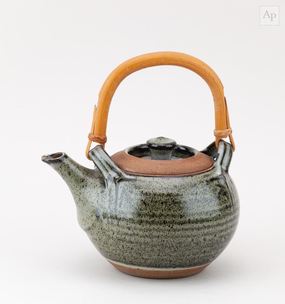 michael casson 1925 2003 a stoneware teapot with cane handle covered in nuka and iron glaze height 13cm excluding handle · Adam Partridge Auctioneers · 2026-03-27 Michael Casson comparable auction result: michael casson 1925 2003 a stoneware teapot with cane handle covered in nuka and iron glaze height 13cm excluding handle