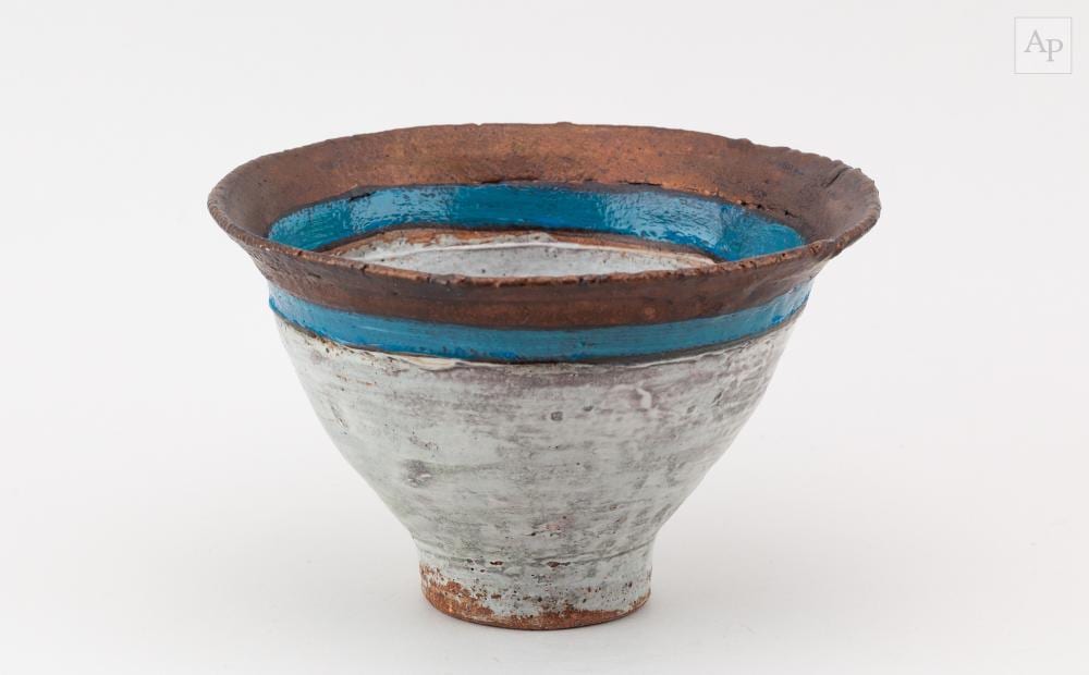 Robin Welch comparable auction result: robin welch 1936 2019 a conical stoneware bowl covered in white glaze with turquoise and bronze rim impressed rw mark diameter 18cm