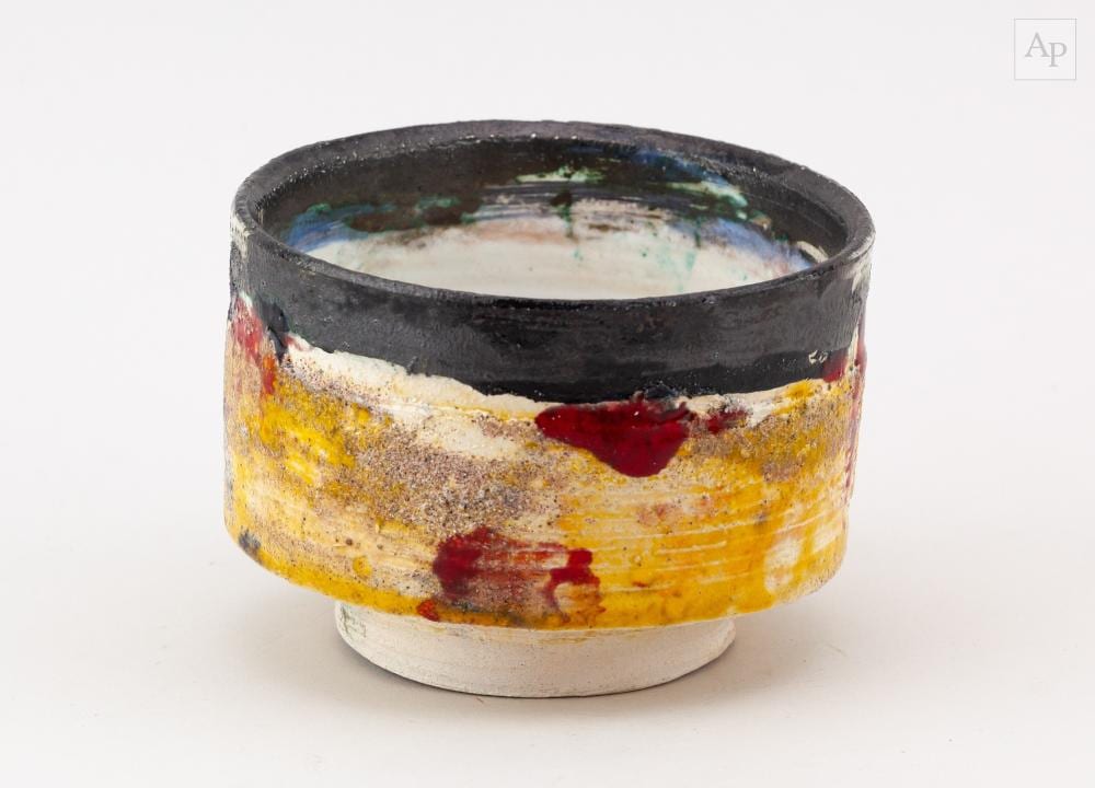 Robin Welch comparable auction result: robin welch 1936 2019 a stoneware bowl with textured surface covered in black and yellow glaze with red and yellow enamel decoration impressed rw mark diameter 12 5cm