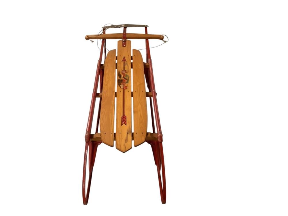 Brown and tan wooden sled with runners and a top frame, photographed against a white background.