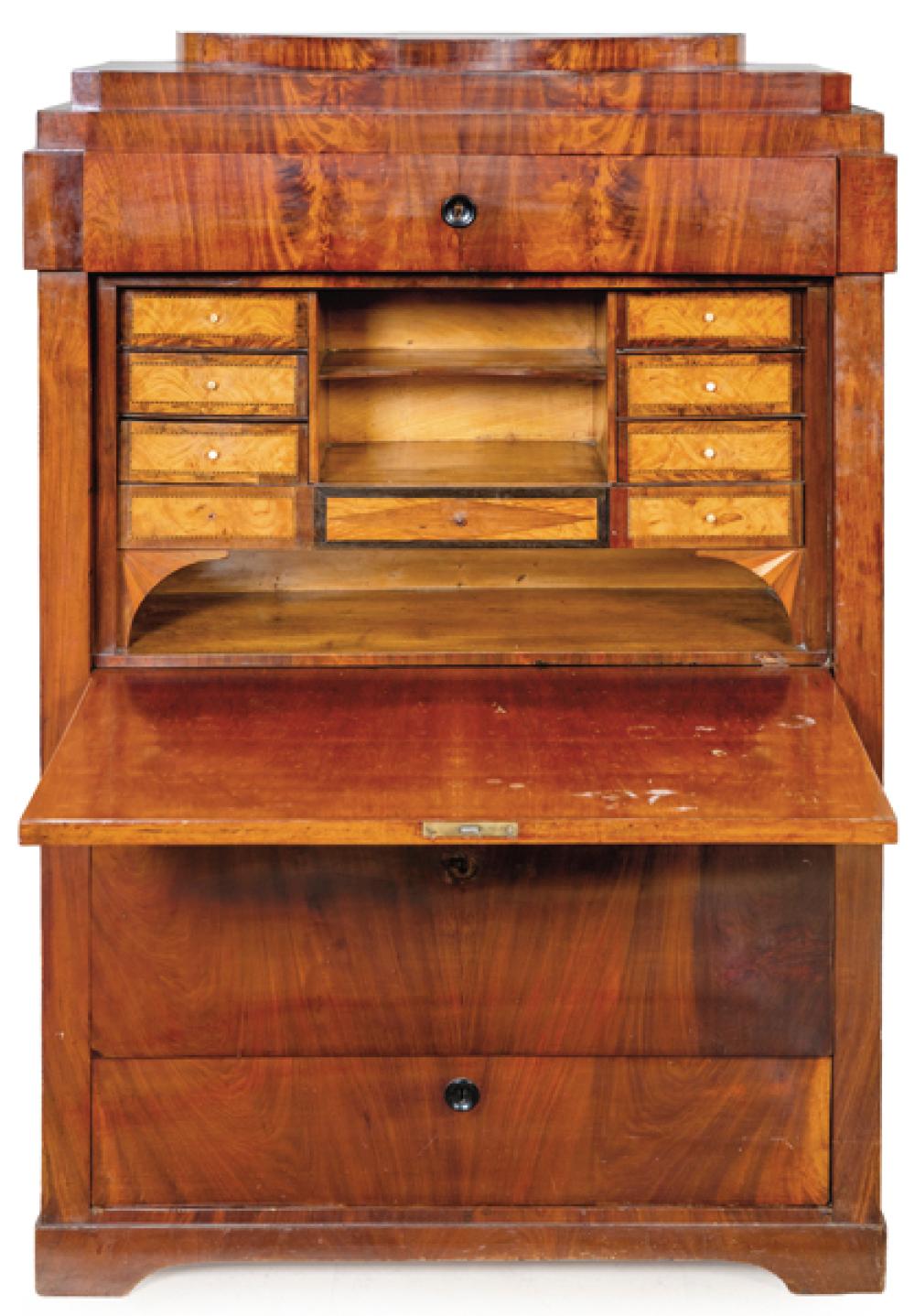 Auction comp thumbnail for Biedermeier "folding" secretary desk in mahogany and mahogany palm. A tall, vertically oriented writing desk with a prismatic proportion, designed to combine the functions of a desk and filing cabinet in a single unit. (Subastas Segre, Lot 1339)