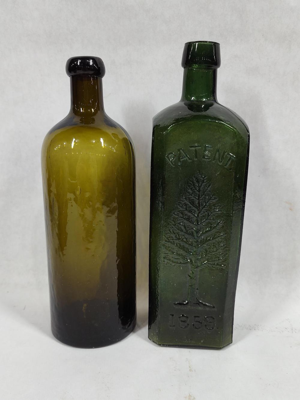 Auction comp thumbnail for 19th C. Pine Tree Tar Cordial Emerald Embossed & Hunyadi Janos Bitterquelle Mineral Water Bottle (Atlee Raber Auctioneer, Lot 125)