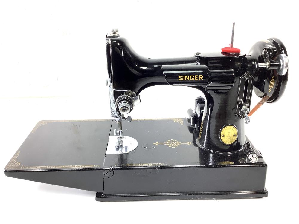 Vintage Singer Featherweight Sewing Machine sold by EJ'S Auction & Appraisal, lot 1039 — auction record photograph