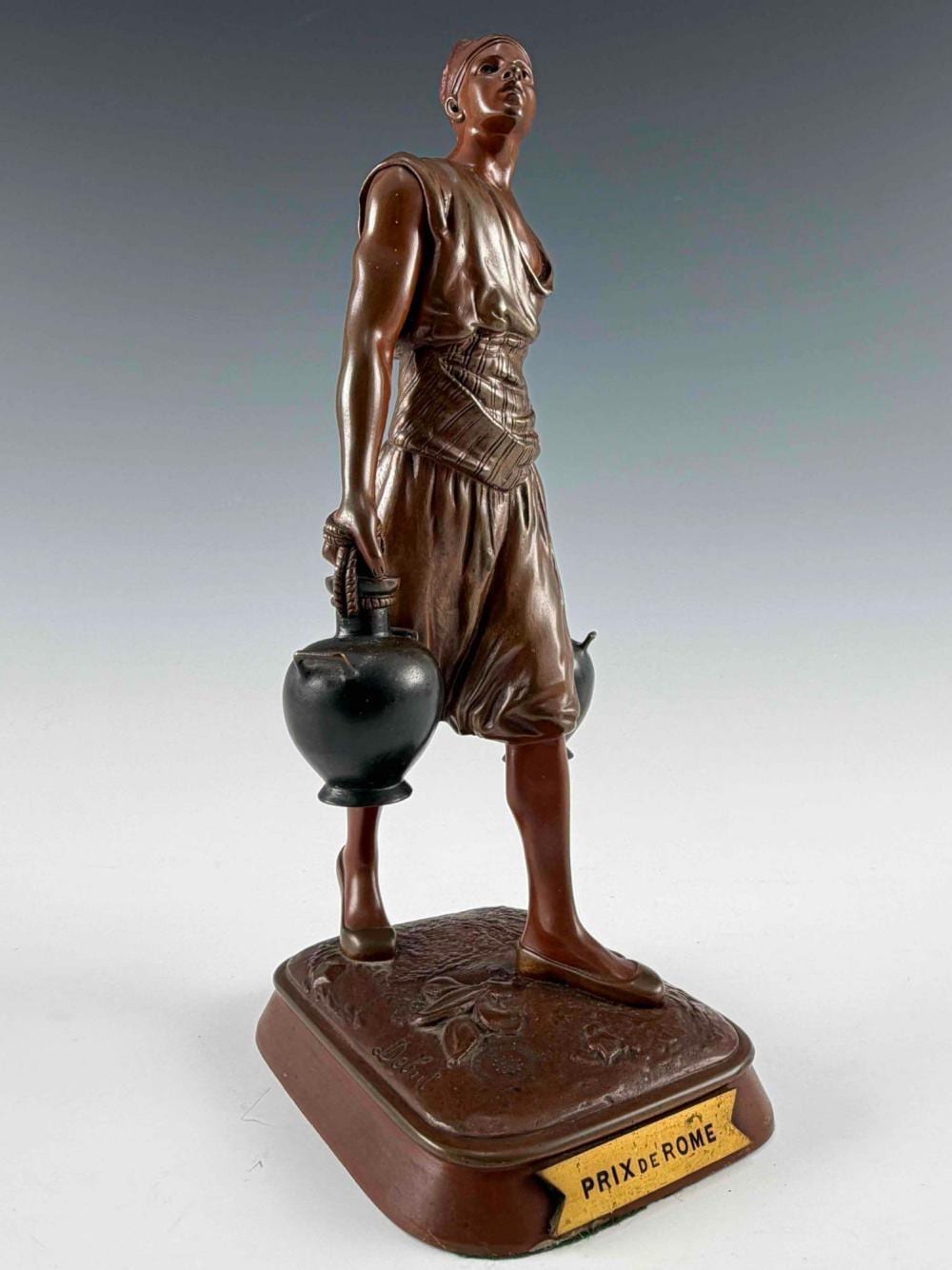 jean didier debut french 1865 1933 tunisian water carrier orientalist bronze sculpture · Clark's Auction Company · 2026-03-28 Didier Debut comparable auction result: jean didier debut french 1865 1933 tunisian water carrier orientalist bronze sculpture