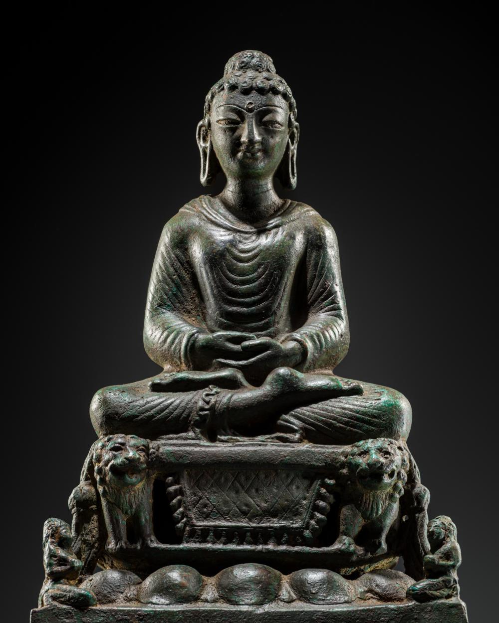 † AN EXCEPTIONALLY LARGE BRONZE FIGURE OF BUDDHA ON THE LION THRONE, SWAT VALLEY, 7TH-8TH CENTURY, TL TESTED sold by Galerie Zacke, lot 249 — auction record photograph