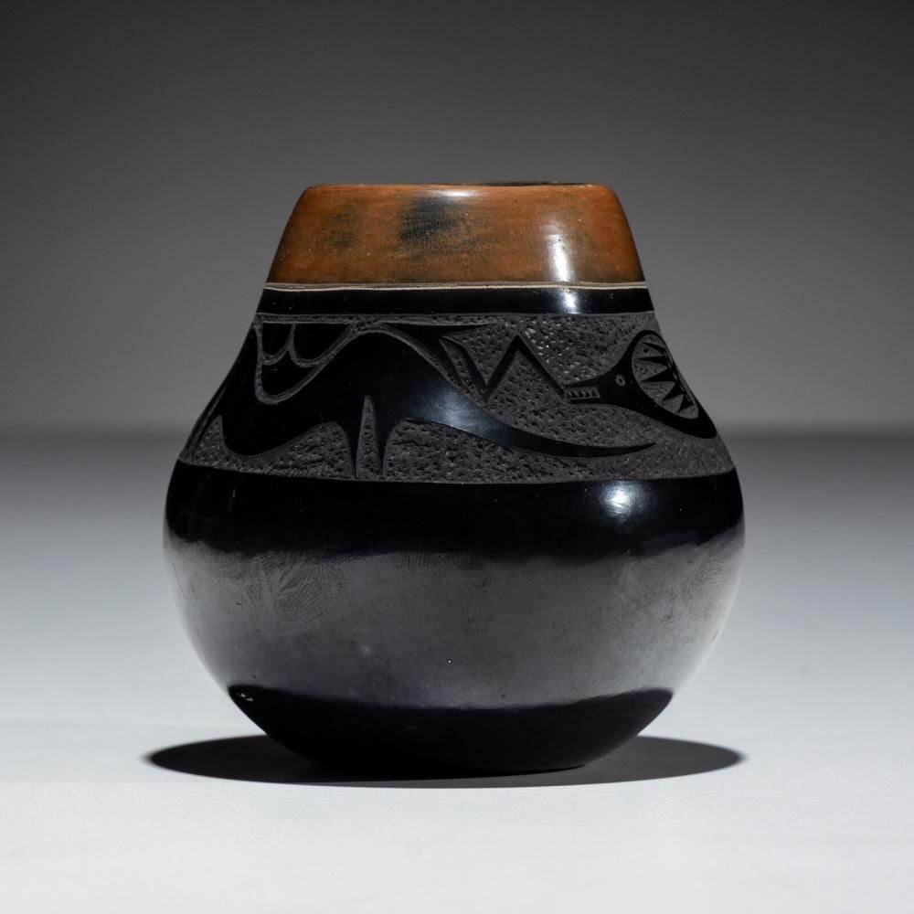 Tony Da comparable auction result: tony da san ildefonso 1940 2008 black and sienna sgraffito pottery jar