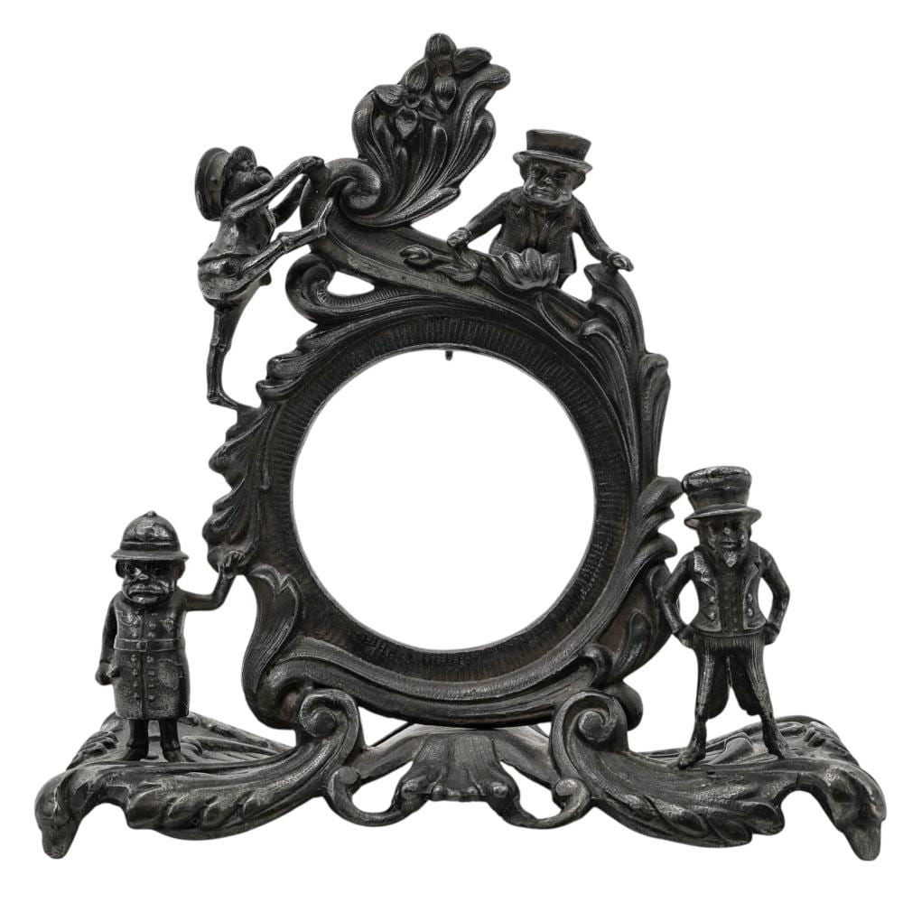 Palmer Cox comparable auction result: palmer cox brownie silver plated pocket watch stand