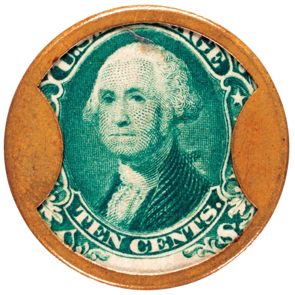 Close-up of a green postage stamp encased in a brown circular holder, featuring a portrait of a man with a collar and text markings around the border.
