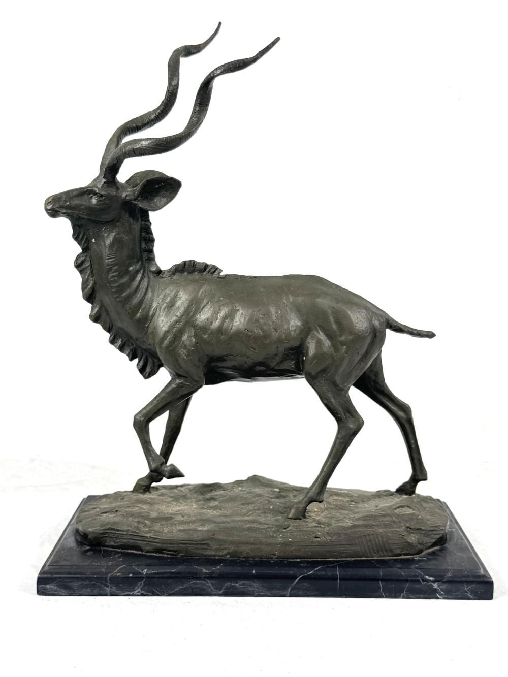 Miguel Fernando Lopez comparable auction result: miguel fernando lopez milo b1955 bronze kudu elk sculpture signed milo height 34cm approx on polished marble base