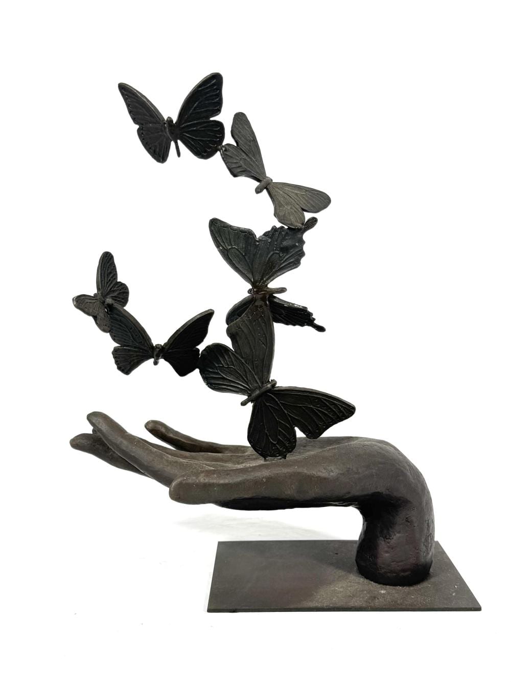 Miguel Fernando Lopez comparable auction result: miguel fernando lopez milo b1955 bronze handful of butterflies sculpture signed milo height 33cm approx on flat metal base
