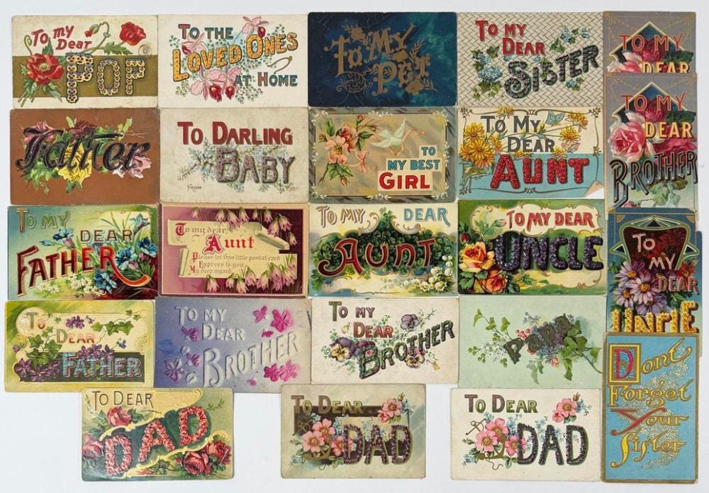 A grid of vintage greeting postcards featuring decorative flowers and the phrases “To My Dear” with family words like Dad, Aunt, Brother, and Father.