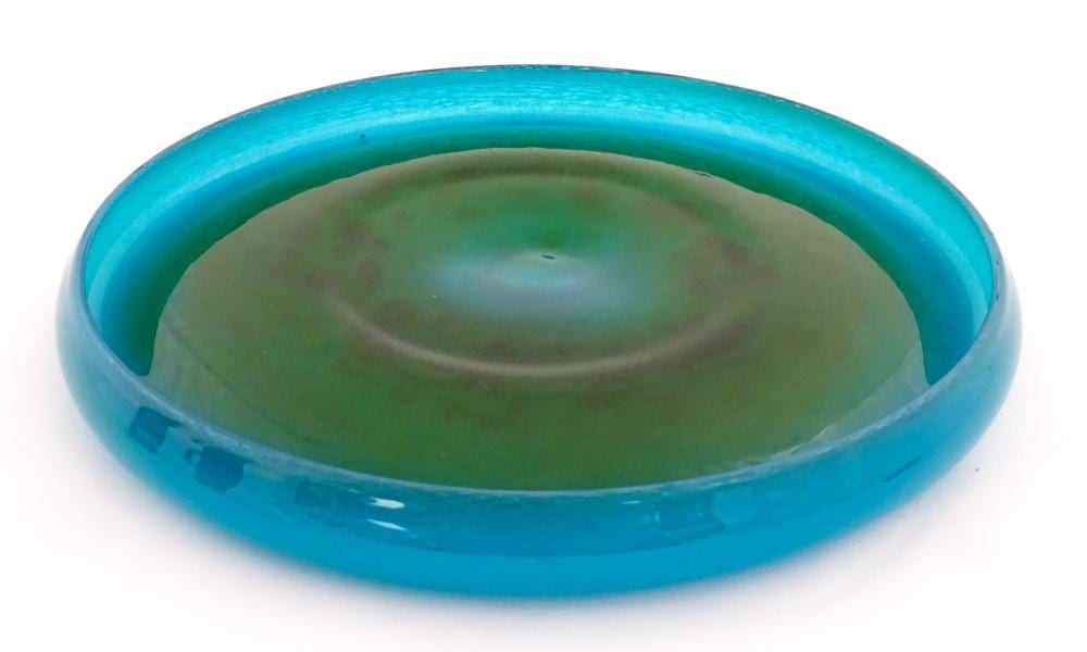 John Webber comparable auction result: a swedish ekenas green and blue glass dish with rolled rim designed by joh