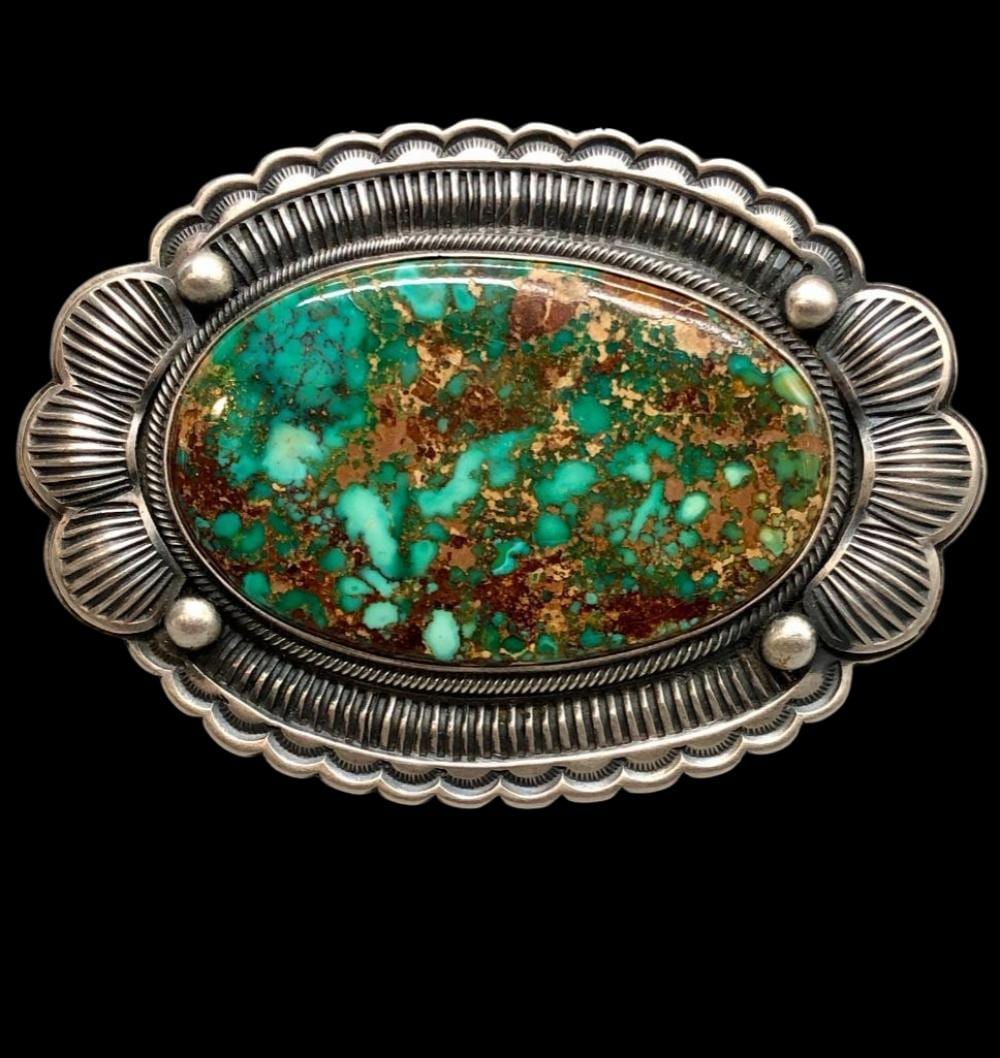 Henry Morgan comparable auction result: phenomenal turquoise pin pendant by henry morgan