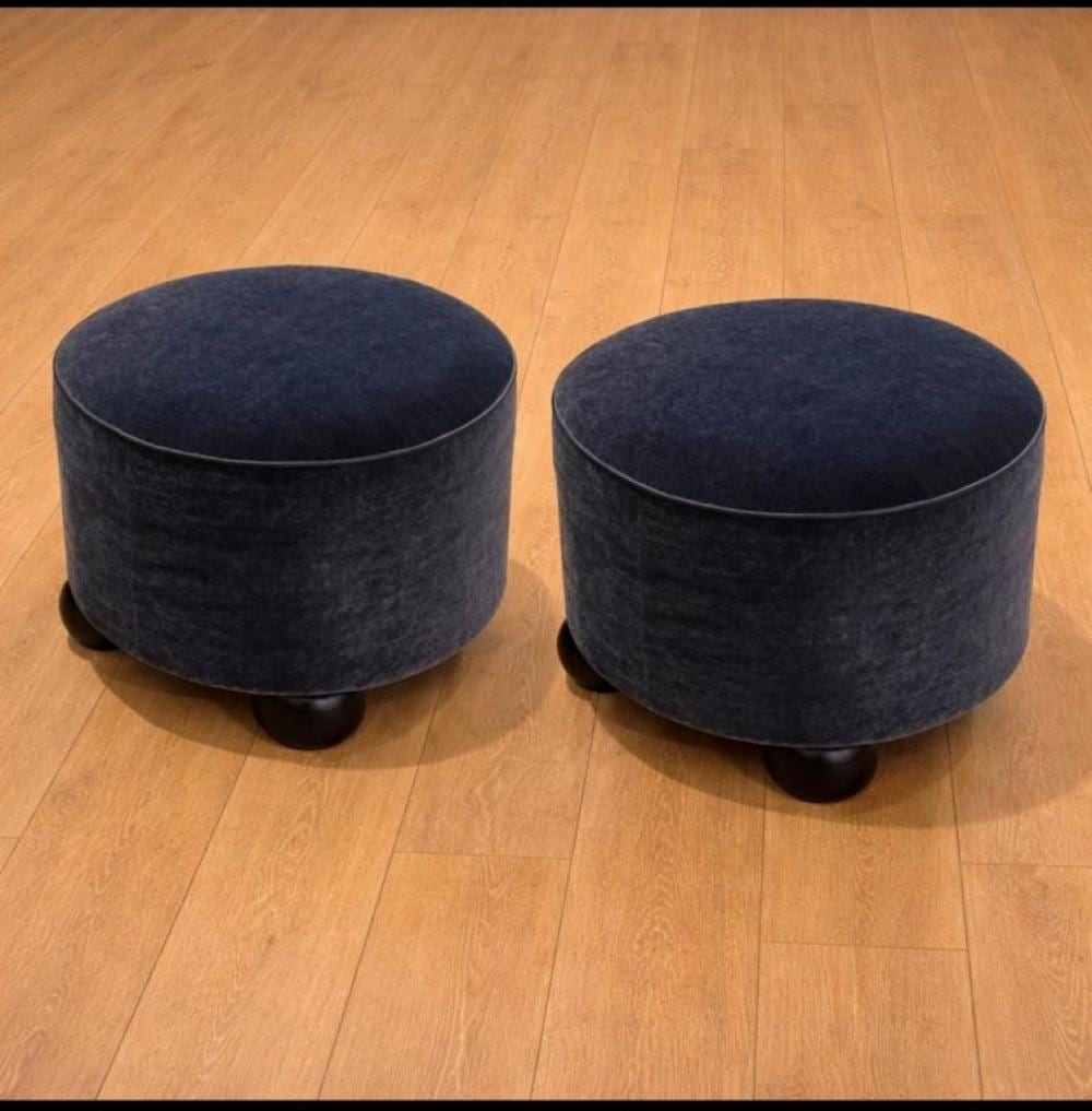 Jean Royere comparable auction result: pair of jean royere foot stools mohair leather