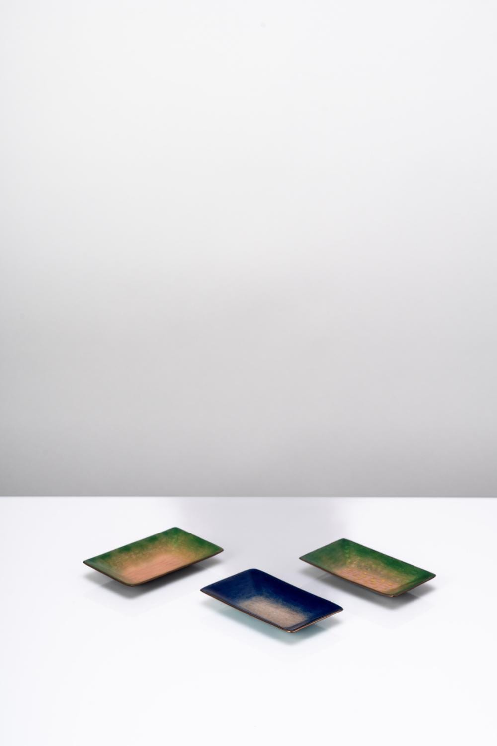 Paolo DePoli comparable auction result: paolo de poli set of three blue and green shades enamelled copper valet trays 1960 circa
