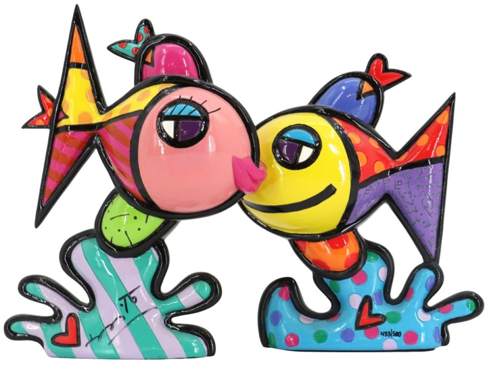 Colorful hand-painted sculpture of two stylized fish facing one another on patterned bases.