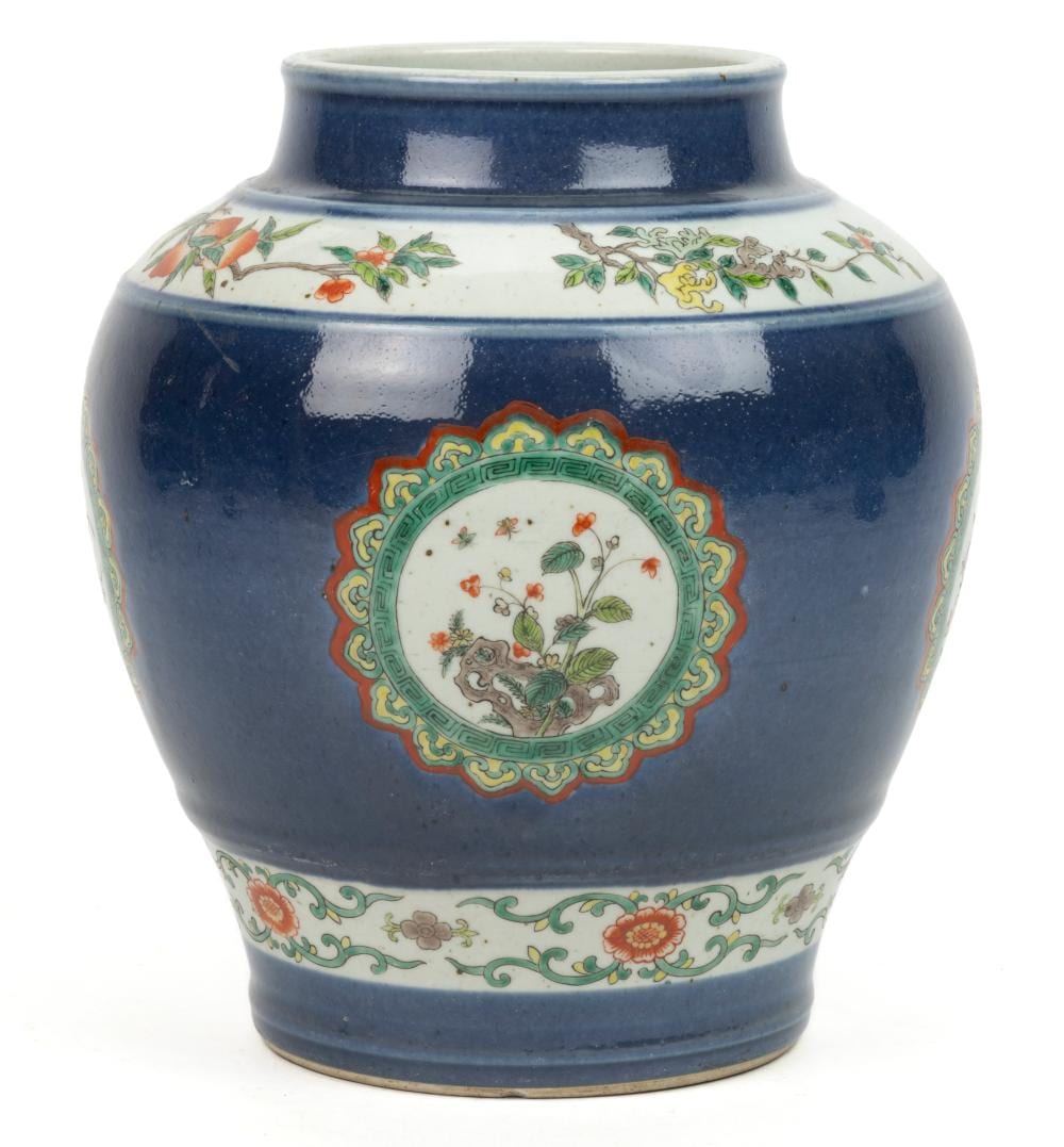 Blue and white porcelain jar with painted floral and bird-and-floral panels around the body and rim.