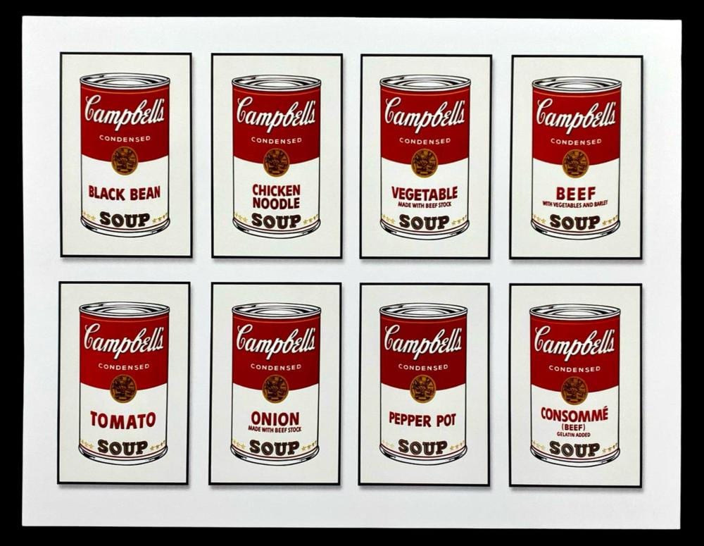 Set of eight framed prints showing Campbell’s condensed soup can labels with flavors like Black Bean, Chicken Noodle, Vegetable, Beef, Tomato, Onion, Pepper Pot