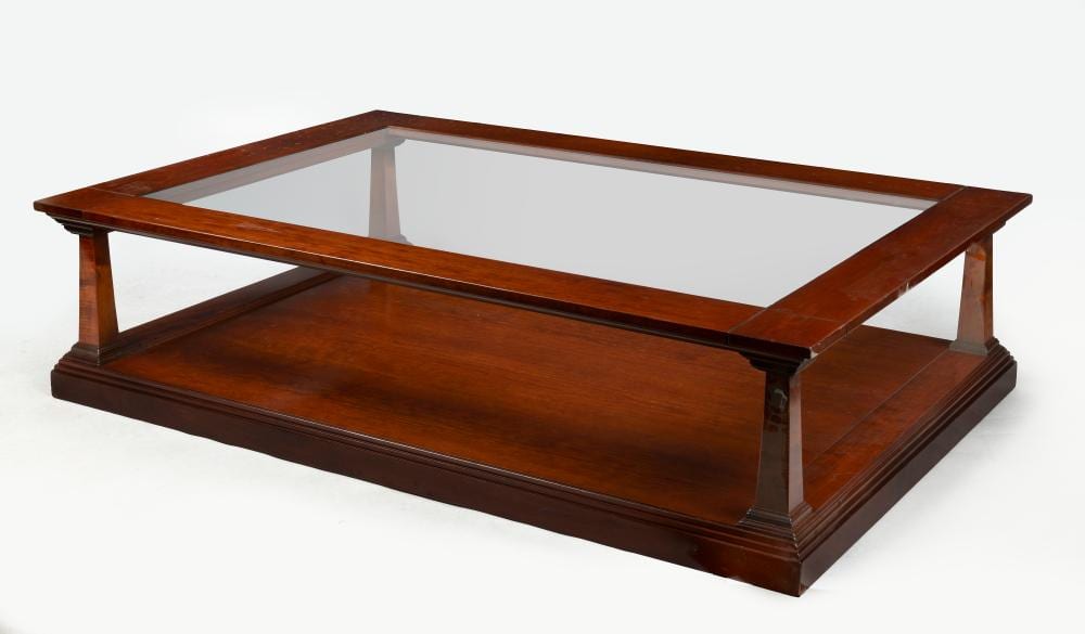 Theodore Alexander comparable auction result: a glass top coffee table by theodore alexander