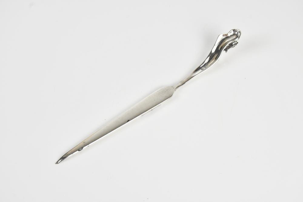 Sarah Jones comparable auction result: sarah jones probably a contemporary elizabeth ii hallmarked silver letter opener with dolphin mount london possibly 1978 length 21cm approx weight 2 1ozt 67g