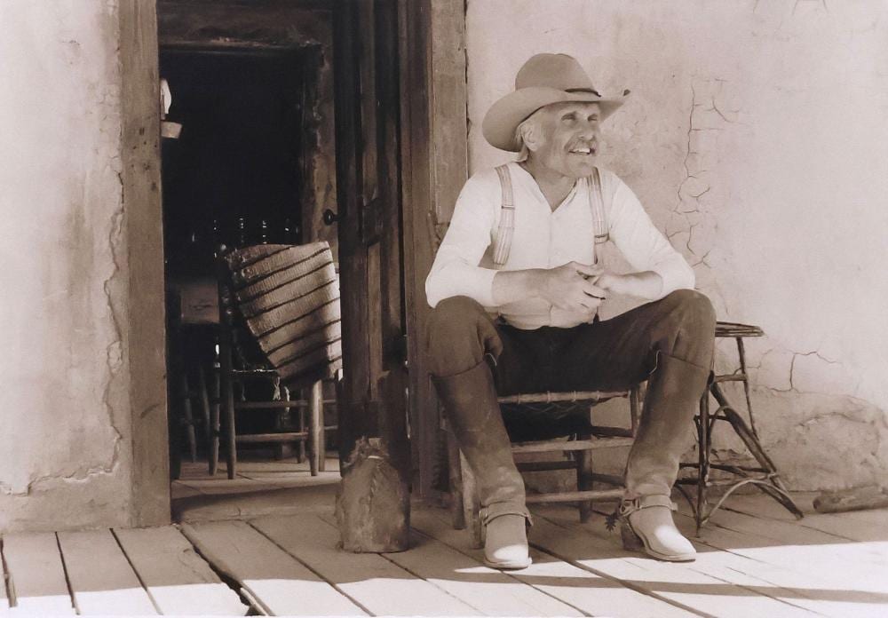 Bill Wittliff comparable auction result: bill wittliff 1940 2019 double signed toned gelatin silver print gus on the front porch