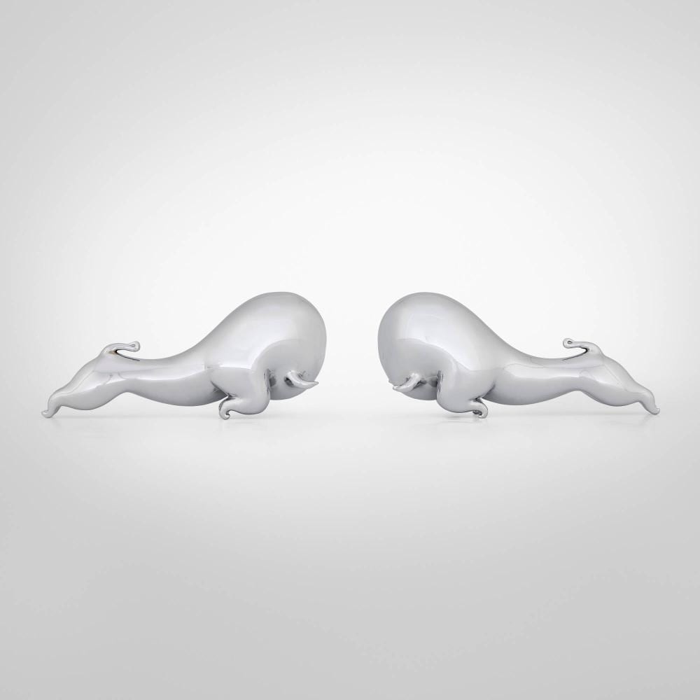 Russel Wright comparable auction result: russel wright rodeo circus bookends pair