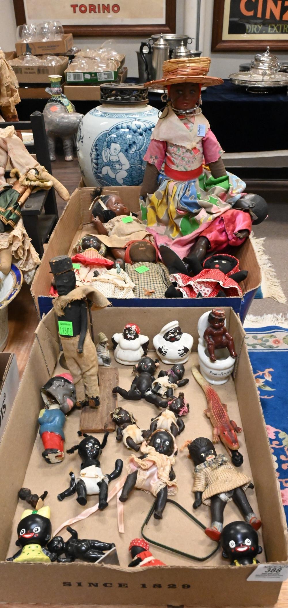 Auction comp thumbnail for Two Box Lots of Black Memorabilia Toys and Dolls to include, various sizes of small bisque baby dolls, black Americana salt and pepper shaker, bobble head, "Mammy" cloth doll with apron stitched "New Orleans", Jamaica... (Nadeau's Auction Gallery, Lot 388)