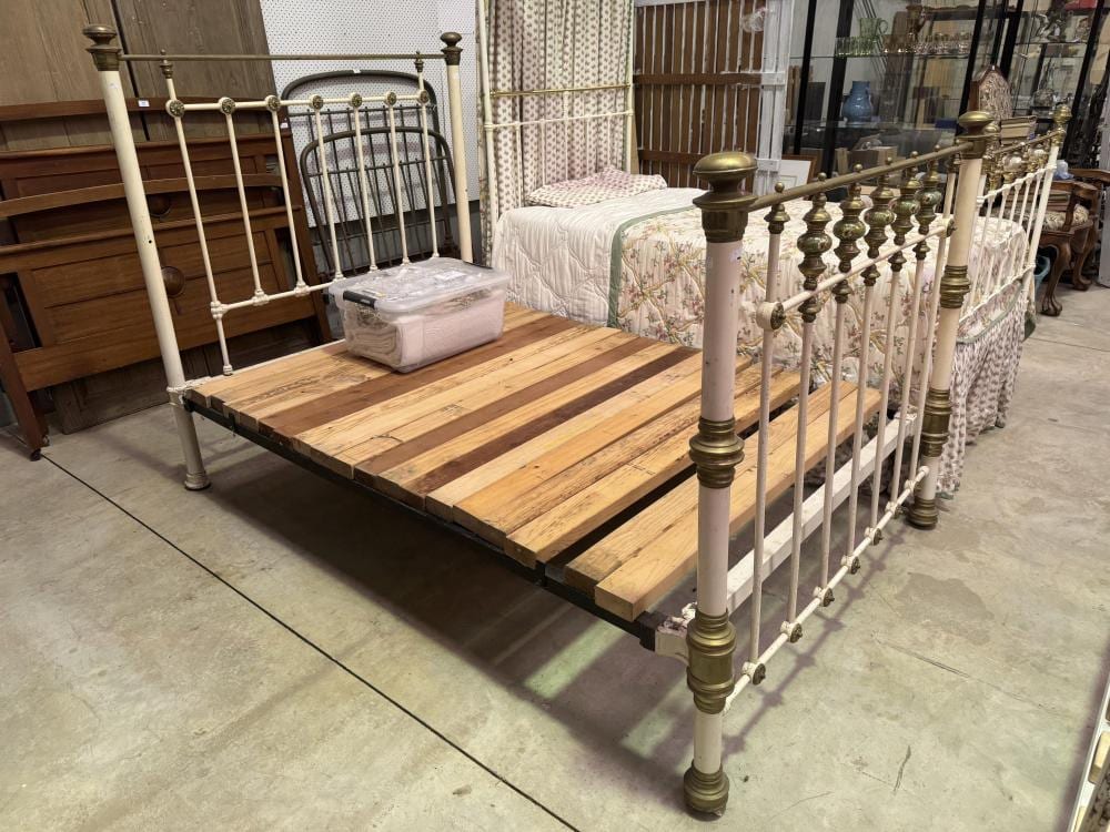 Antique Victorian double iron and brass mounted bed sold by Vickers & Hoad, lot 850 — auction record photograph