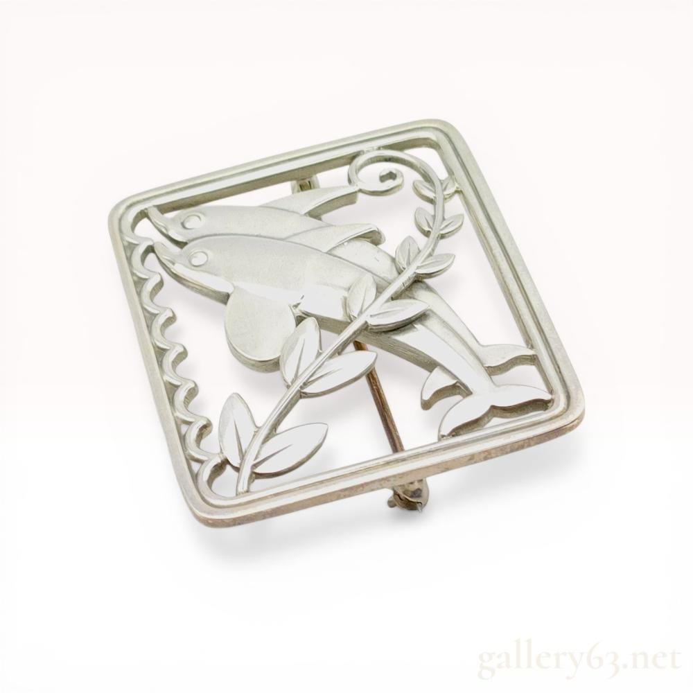 Arno Malinowski comparable auction result: georg jensen sterling silver two dolphins brooch no 251 by arno malinowski