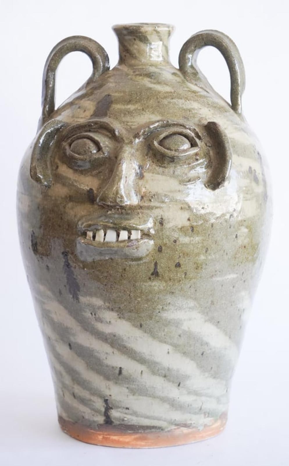 Burlon Craig comparable auction result: exception north carolina stoneware face jug by burlon craig