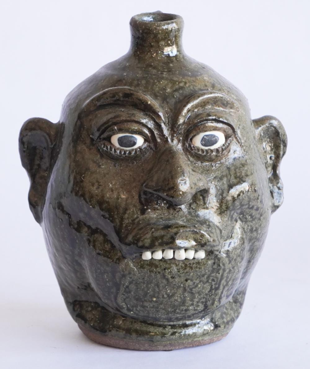 Lanier Meaders comparable auction result: handsome southern stoneware georgia face jug by lanier meaders