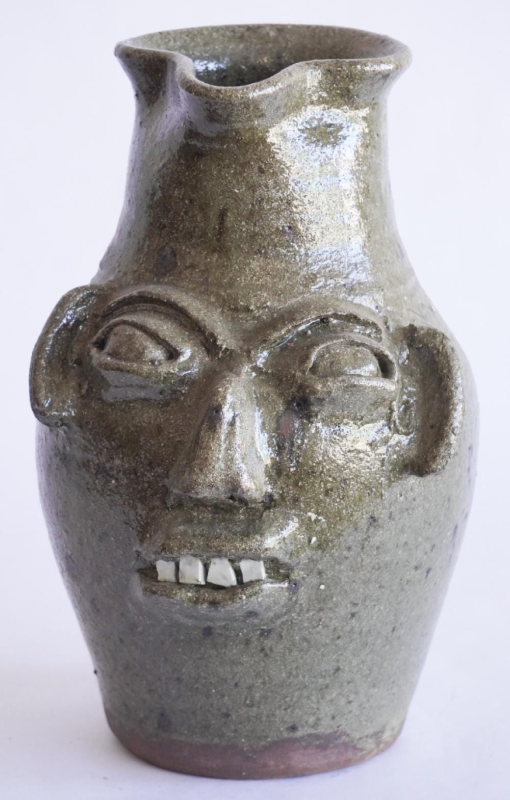 Burlon Craig comparable auction result: very fine north carolina stoneware face jug pitcher by burlon craig